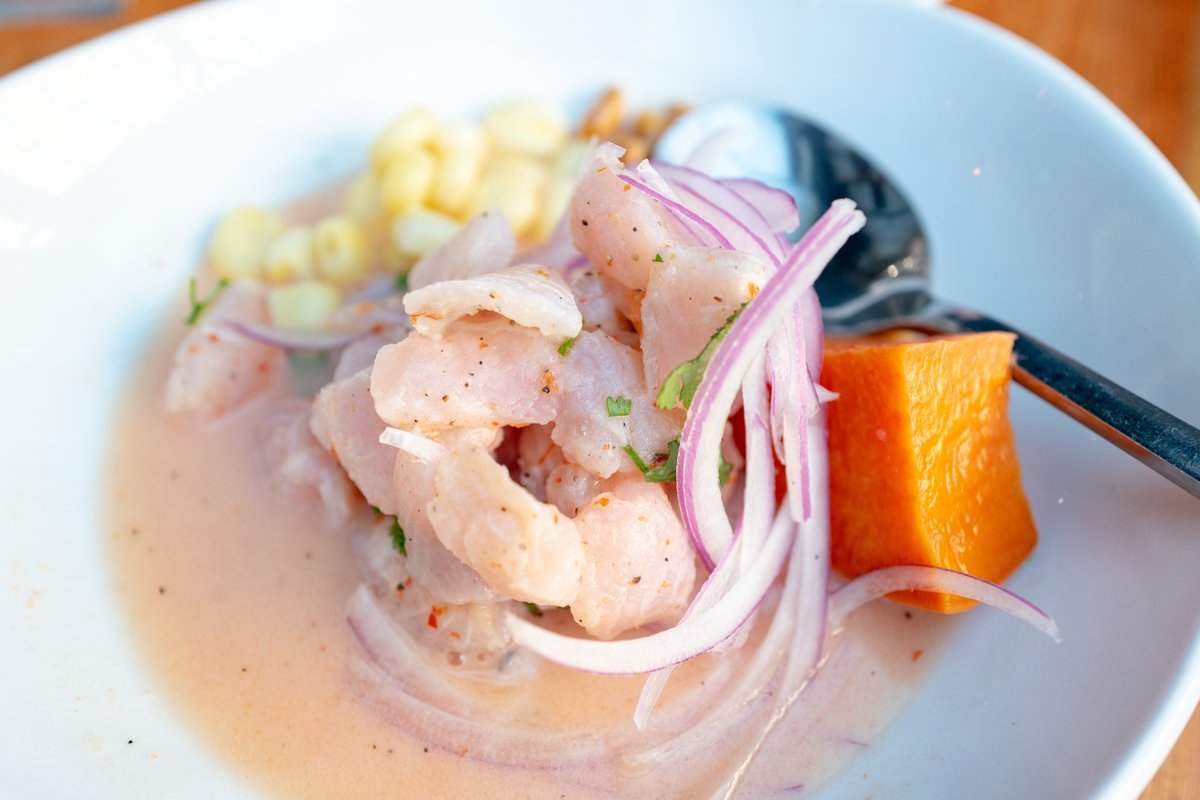 Close-up of the Peruvian dish cebiche pescado with fresh fish and shaved onions at the Parada Kitchen Peruvian Restaurant in Walnut Creek, California, February, 2021.
