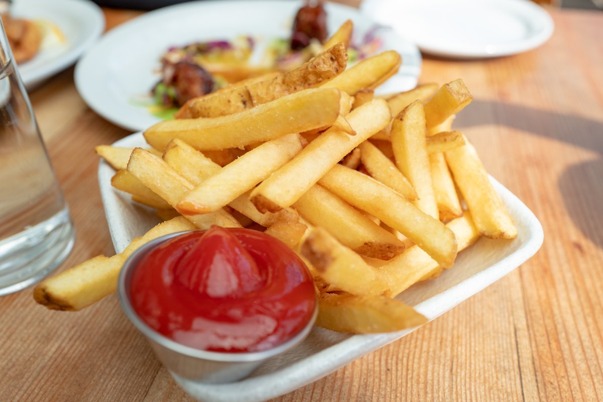 Plate of french fries and ketchup at Parada restaurant in Walnut Creek, California, March 4, 2021.